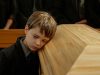 The Boy Rested His Ear Against His Mother’s Coffin And Spoke Words That Made Everyone In The Church Fall Silent.