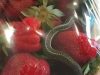 A basket of bright red strawberries, an expected treat – but it held a terrifying discovery