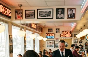 My arrogant boss thought it was funny to slap a homeless man’s food right onto the dirty floor. He thought he was just bullying a nobody—until he walked back inside and discovered who that man actually was, instantly destroying his own career.